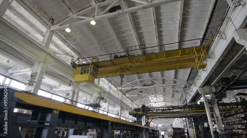 Wallpaper Mural Bridge crane rides on factory floor Torontodigital.ca