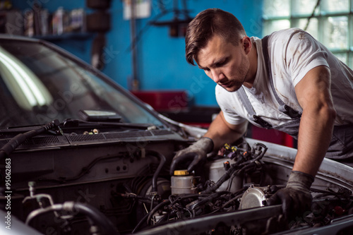 Car inspection at mechanic shop