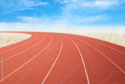 outdoor running track with desert and sky background