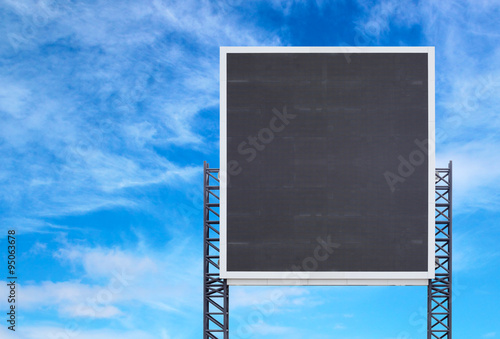 large sign board with blue sky