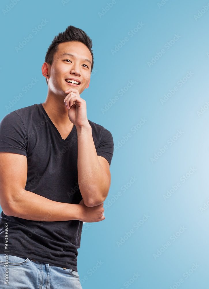 portrait of handsome young asian man thinking portrait of handsome young asian man thinking