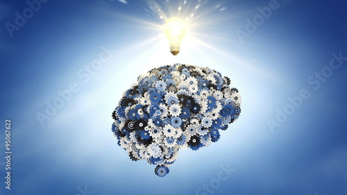 Blue Sky Thinking: A clockwork brain and a moment of inspiration illustrating concepts of breakthrough and brainstorming. photo