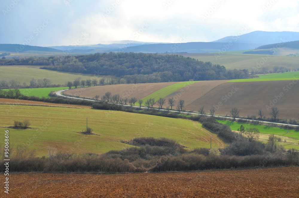 Fototapeta premium Farmland around Saris castle hill.