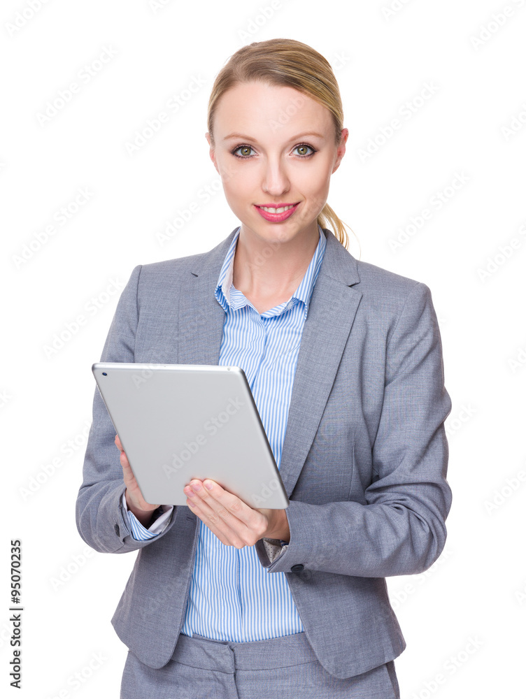 Caucasian Businesswoman use of the tablet pc Caucasian Businesswoman use of the tablet pc
