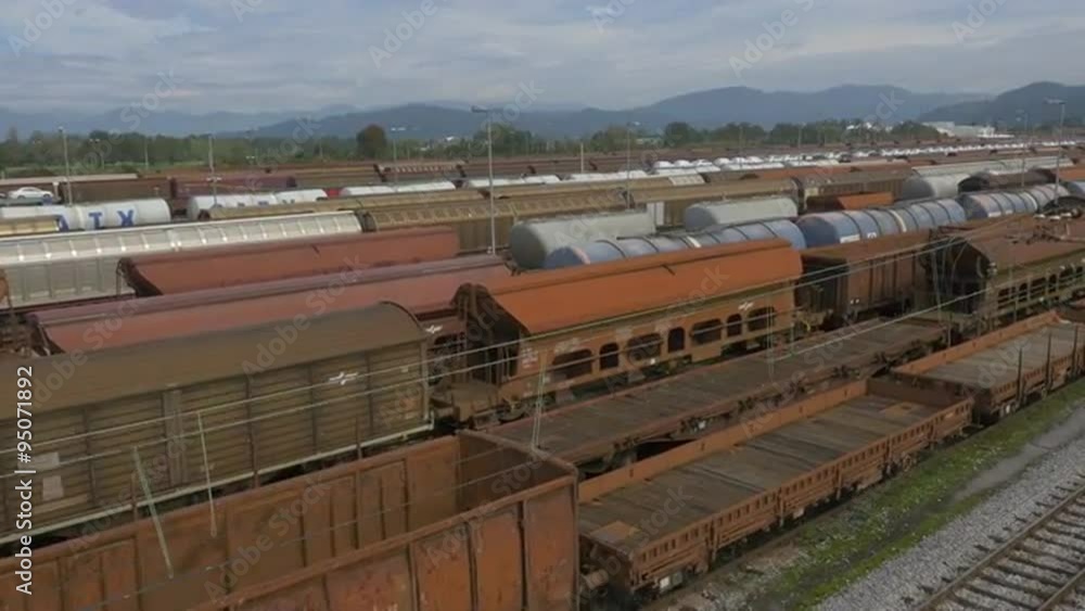 AERIAL: Freight trains on a railroad station AERIAL: Freight trains on a railroad station