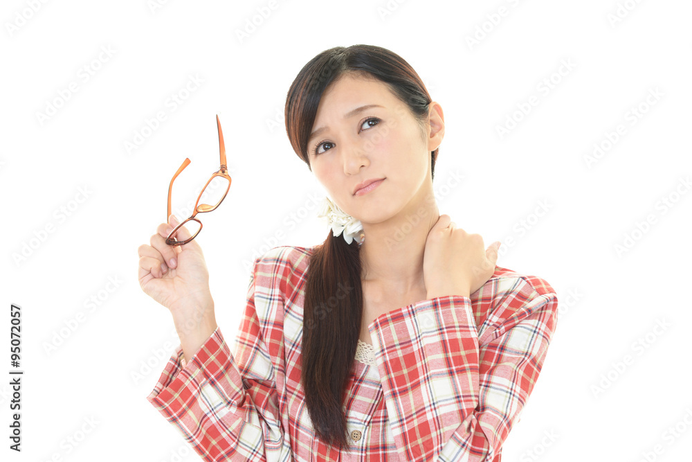 肩こりに悩む女性 肩こりに悩む女性