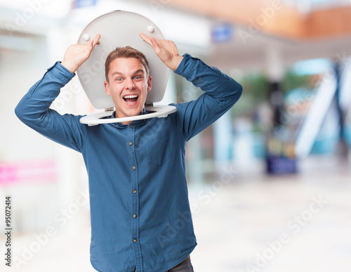 young-man joking with a toilet