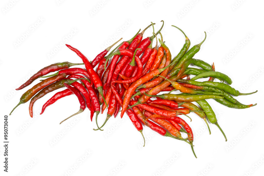 Naklejka premium Pile of colorful chillies on white background