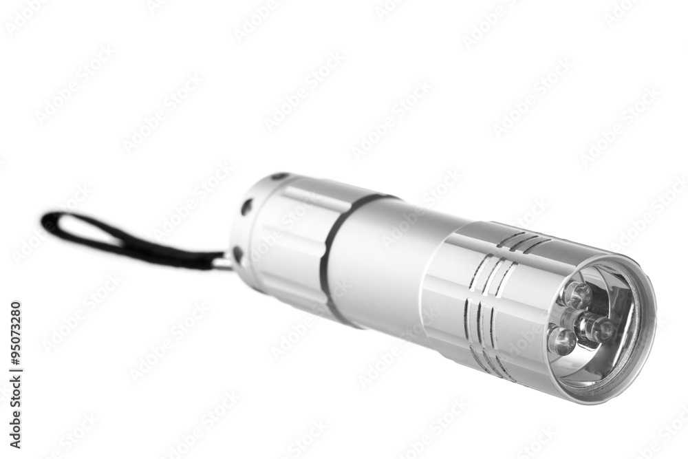 Silver pocket flashlight or lamp isolated on white Silver pocket flashlight or lamp isolated on white