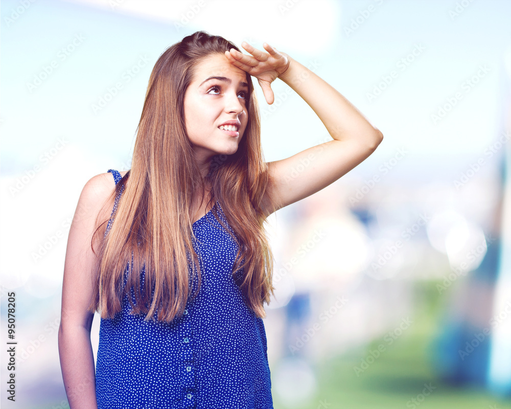 young woman looking far gesture