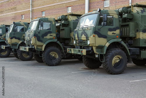 new military trucks on the parking lot