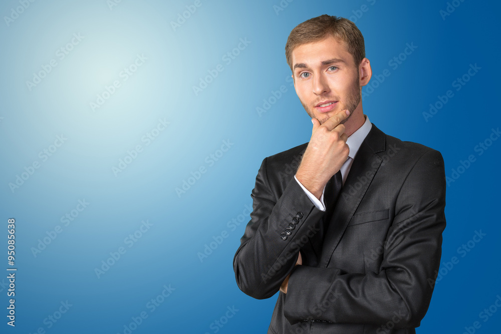 Confused young businessman thinking Confused young businessman thinking