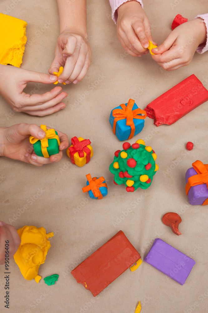 Children playing with plasticine Children playing with plasticine