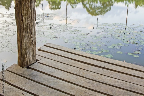 foundation pile, wood terrece floor on Lotus pool background and texture photo