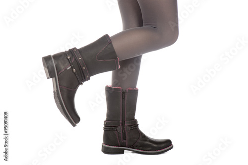 View of girl leather's boots -isolated on the white background.
