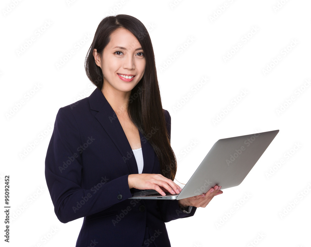 Businesswoman use of the noetbook computer Businesswoman use of the noetbook computer