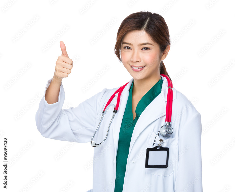 Doctor woman showing thumb up gesture Doctor woman showing thumb up gesture