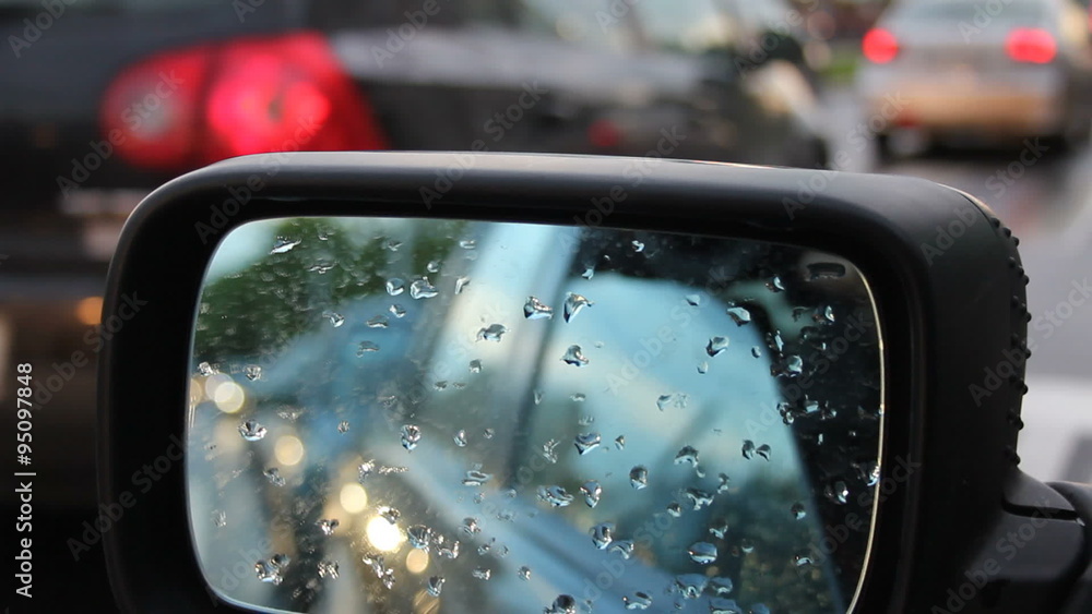 Rain spotted car rear mirror Rain spotted car rear mirror