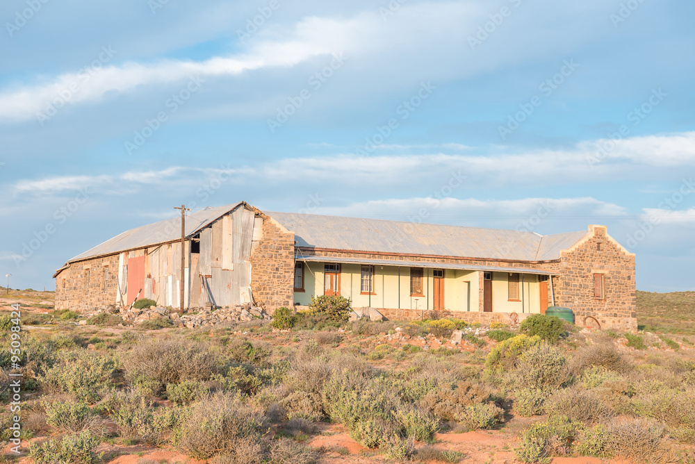 Old school building at Wallekraal at sunset