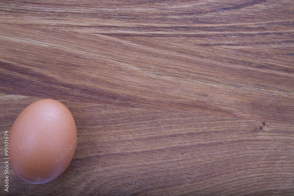 brown egg on wood brown egg on wood