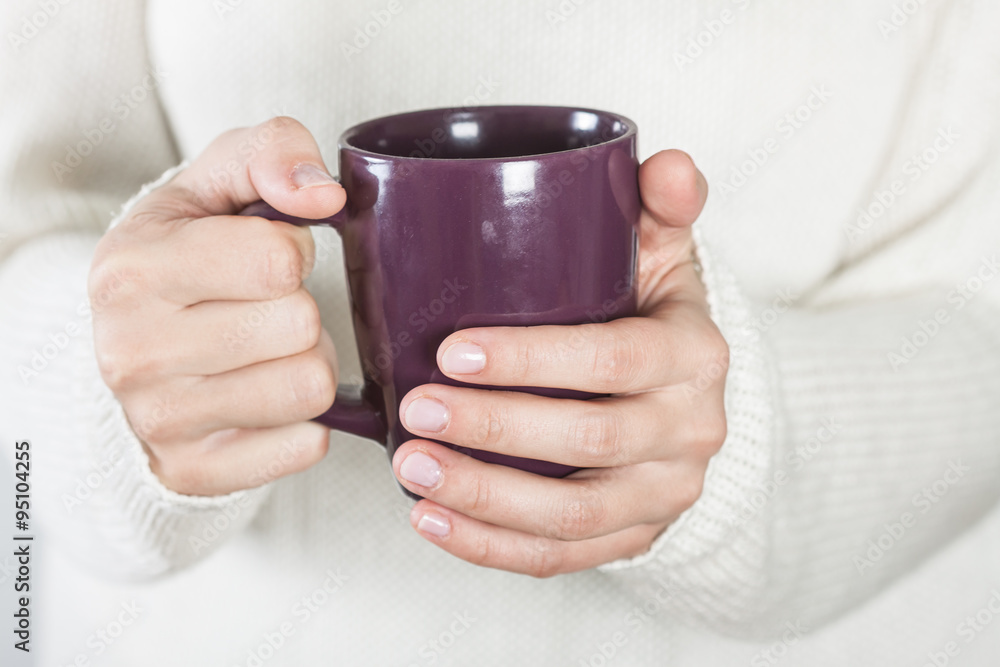 Cup of tea or coffee in female hands Cup of tea or coffee in female hands