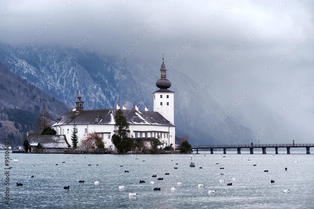 Monastery on the island of alpine lake in Gmunden by Salzburg, Austria