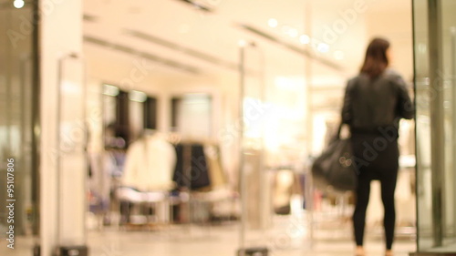 People passing through store entrance