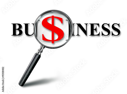 business red word and dollar on magnifying glass