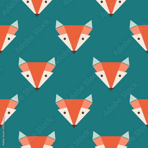 Cute foxes seamless vector pattern. Orange fox's head on blue background