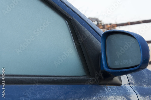 frost on the car mirror