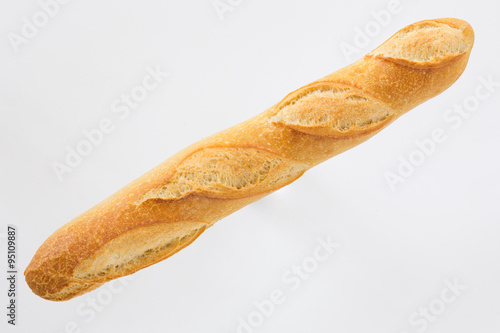 French bread baguette on a white background, made from flour. baking, top view, side view. space for text ..