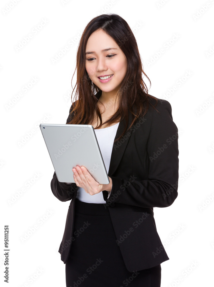 Young Businesswoman use of the tablet pc Young Businesswoman use of the tablet pc