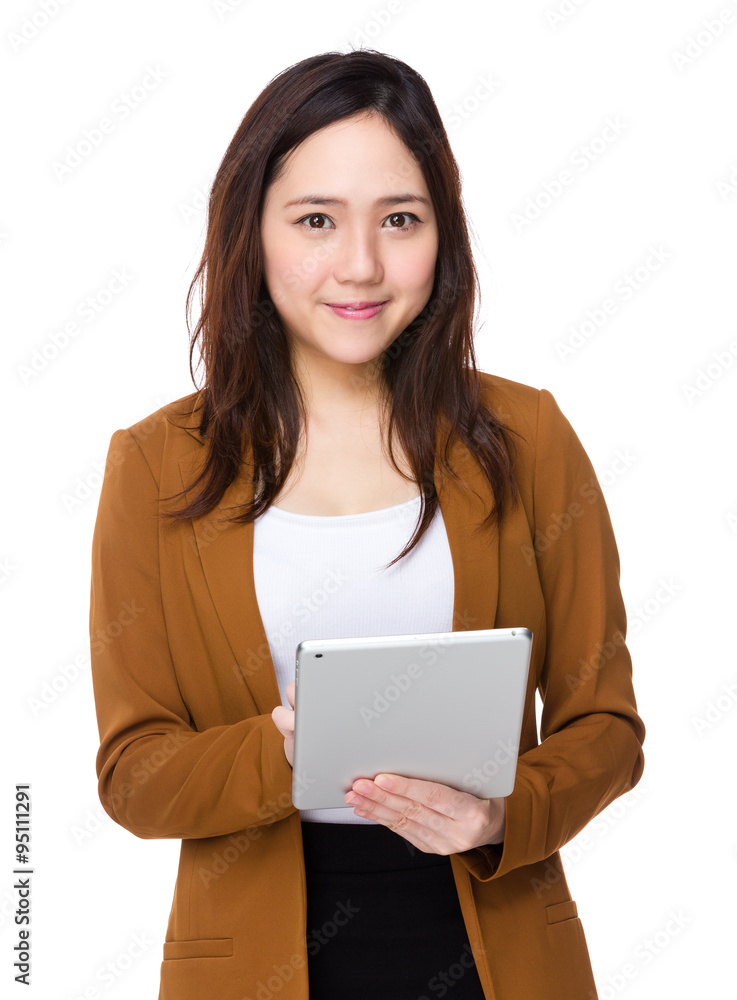 Asian Young Businesswoman use of the tablet pc Asian Young Businesswoman use of the tablet pc