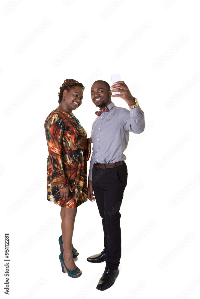 A mother and her son taking a picture of themselves on a cell phone A mother and her son taking a picture of themselves on a cell phone