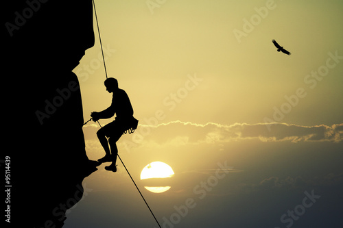 man climber at sunset
