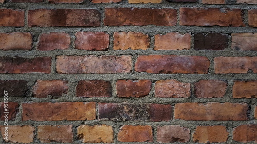 Old brick wall. Traveling vertically, from top to bottom. Animated still picture.
