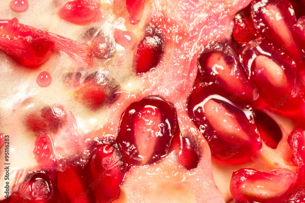 Macro Close-Up of a Ripe Succulent Pomegranate Macro Close-Up of a Ripe Succulent Pomegranate