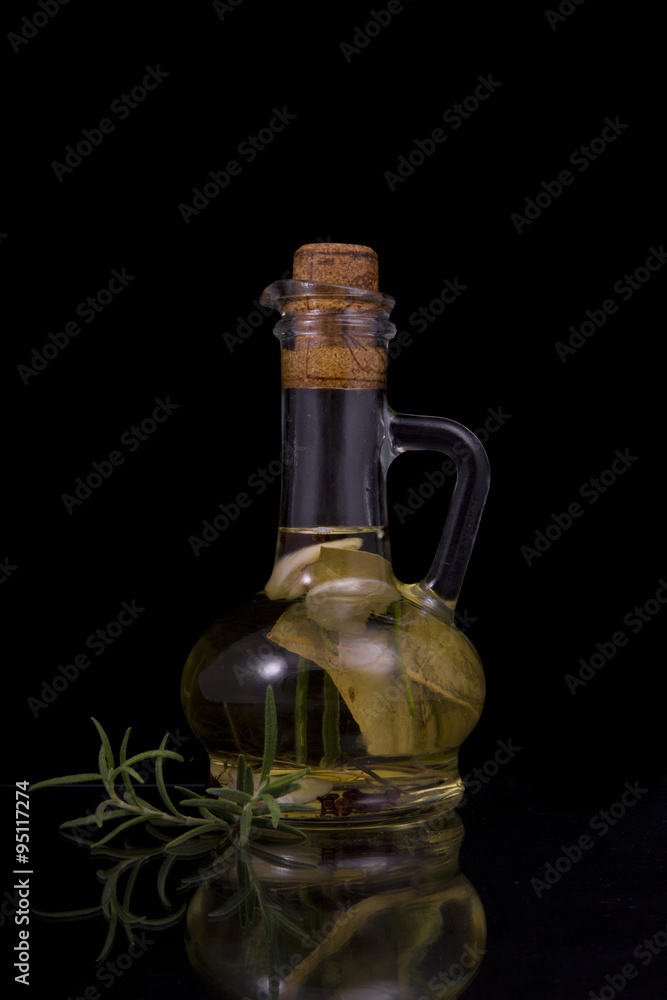 appetizing bottle of olive oil infused with rosemary, spices, ga appetizing bottle of olive oil infused with rosemary, spices, ga