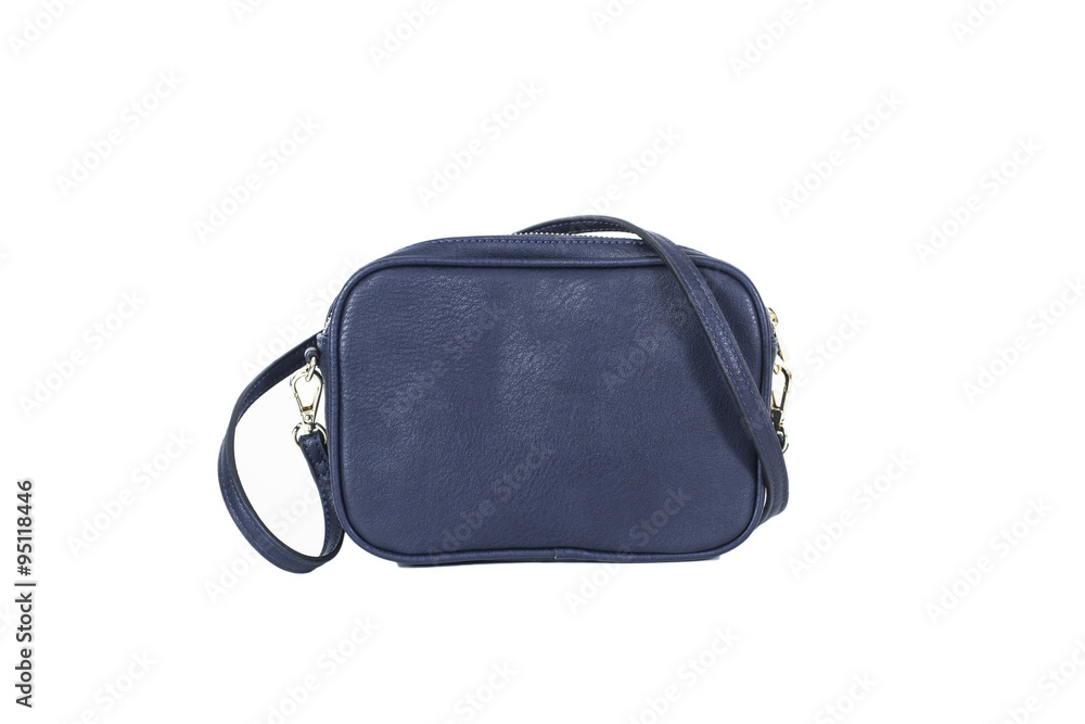Naklejka premium Bolso azul pequeño de piel sobre fondo blanco aislado. Vista de frente. Copy space