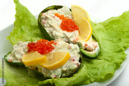 red caviar with avocado and salad