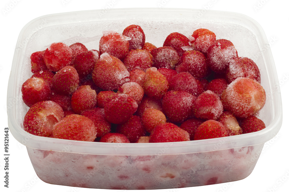 frozen strawberries in a plastic container frozen strawberries in a plastic container