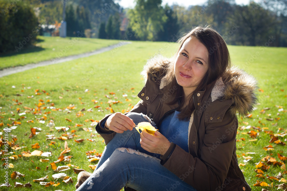 Pretty young girl enjoying beautiful nature during sunny day Pretty young girl enjoying beautiful nature during sunny day