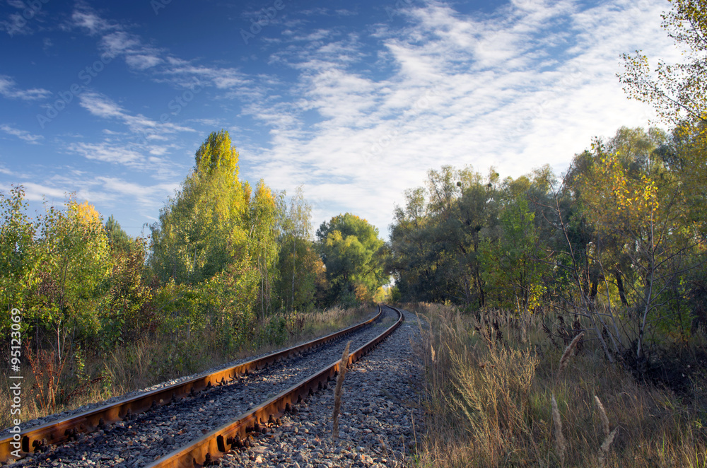 Industrial landscape - old abandoned railway receding into the d Industrial landscape - old abandoned railway receding into the d