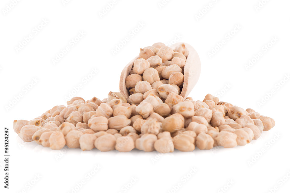 Uncooked chickpeas and wooden scoop Uncooked chickpeas and wooden scoop