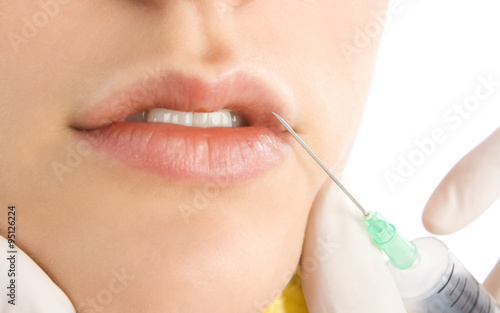 woman applying botox