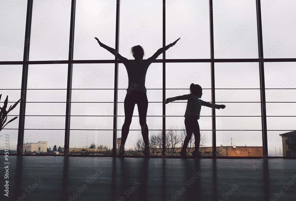 Charming family spends time in the gym Charming family spends time in the gym