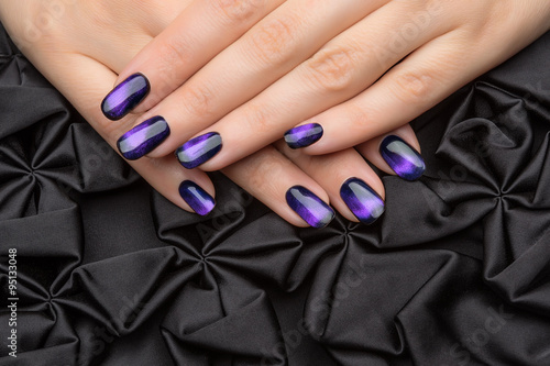 Beautiful woman's nails with nice stylish manicure.