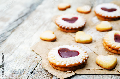 Shortbread with the shape of a heart and berry jam