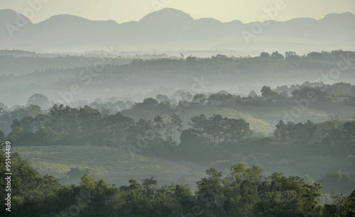 View across the Vinales Valley in Cuba. Morning twilight and fog.