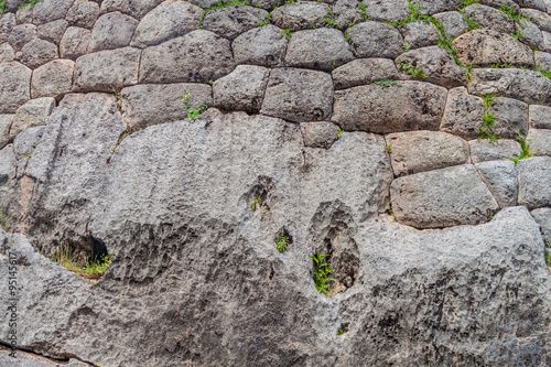 Detail of Inca's perfect stonework at ruins of Pukapukara near Cuzco, Peru. photo